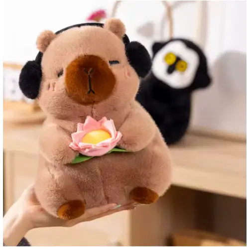 Capybara cuddly toy with headphones - Surprey