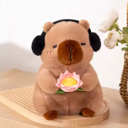 Capybara cuddly toy with headphones - Surprey