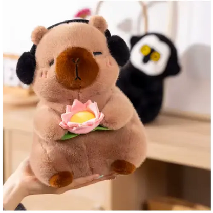 Capybara cuddly toy with headphones - Surprey